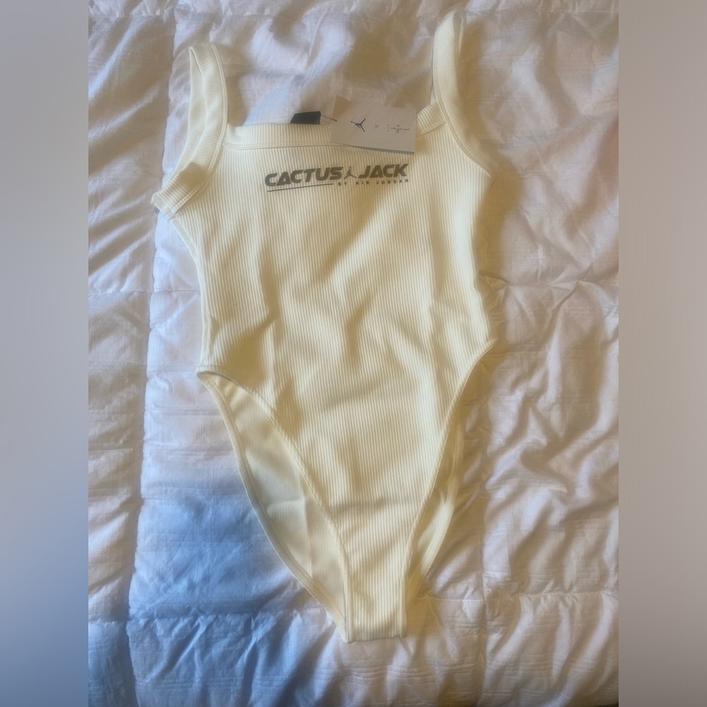 Limit edition Travis Scott body suit. Sold out new with tags